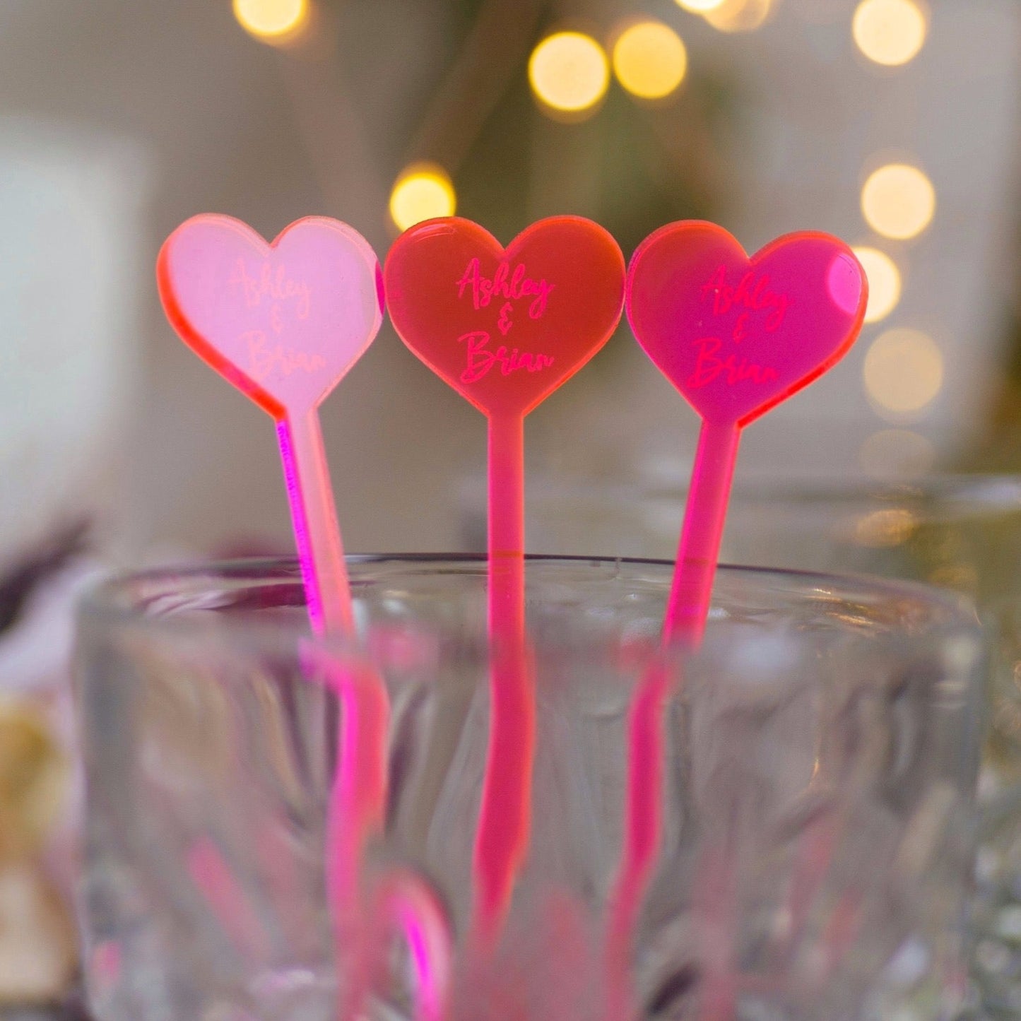 heart shaped neon pink acrylic engraved drink stirrers custom wedding drink stirrers personalized acrylic cocktail stir sticks custom drink charm bespoke event swizzle sticks drink topper birthday party last name date celebration