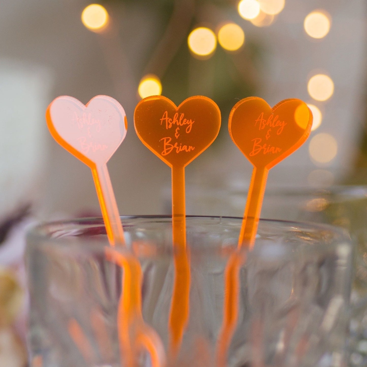 heart shaped neon orange acrylic engraved drink stirrers custom wedding drink stirrers personalized acrylic cocktail stir sticks custom drink charm bespoke event swizzle sticks drink topper birthday party last name date celebration