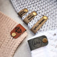 faux leather tags vegan knit labels horizontal crochet no sew tag logo custom product tags rivet knit personalized vegan craft labels knit logo tags crochet faux leather labels hats mittens scarves coffee cup warmers clothing headbands blankets