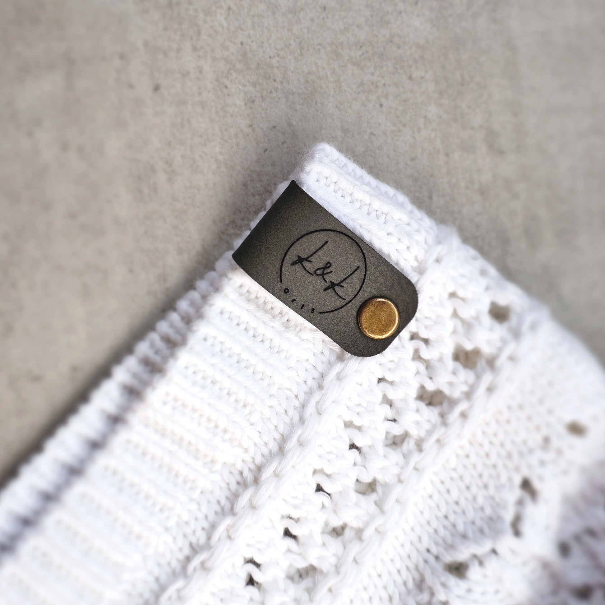 faux leather tags vegan knit sweater labels horizontal crochet no sew tag logo custom product tags rivet knit personalized vegan craft labels knit logo tags crochet faux leather hats mittens scarves coffee cup warmers clothing headbands blankets