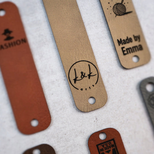 faux leather tags vegan knit labels horizontal crochet no sew tag logo custom product tags rivet knit personalized vegan craft labels knit logo tags crochet faux leather labels hats mittens scarves coffee cup warmers clothing headbands blankets